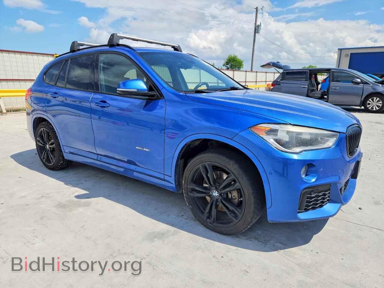 2017 BMW X1 - VIN: WBXHT3C37H5F80031 - Фото 4