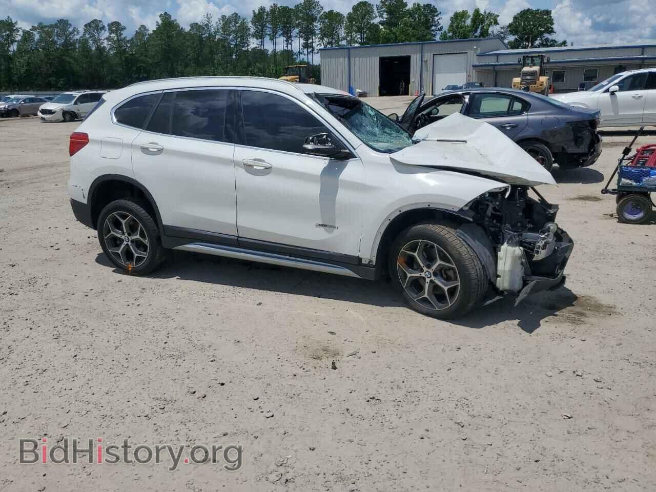 2017 BMW X1 - VIN: WBXHT3Z30H4A65689 - Фото 4