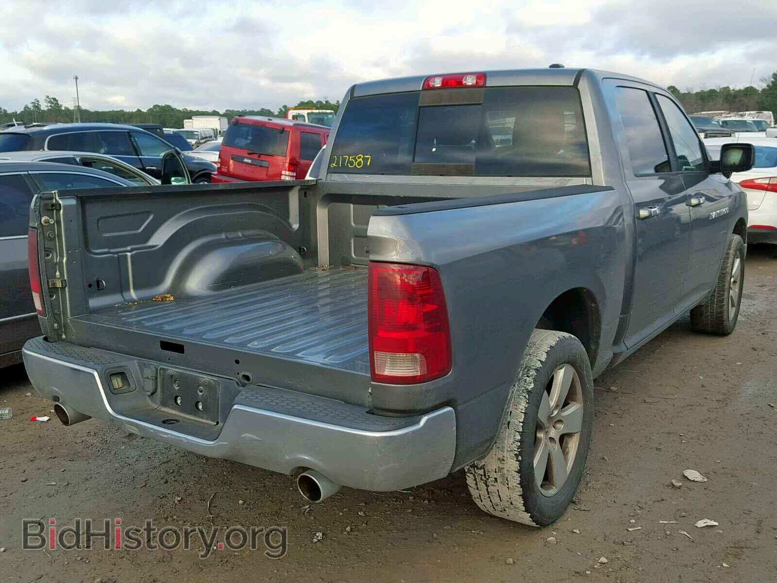 2011 DODGE RAM 1500 - VIN: 1D7RB1CT5BS635788 - Фото 4