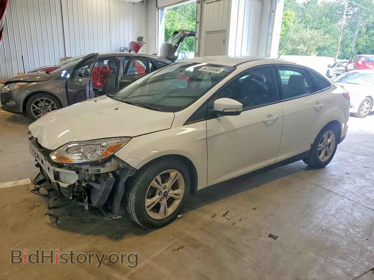 Фотография 1FADP3F20DL138428 - FORD FOCUS 2013