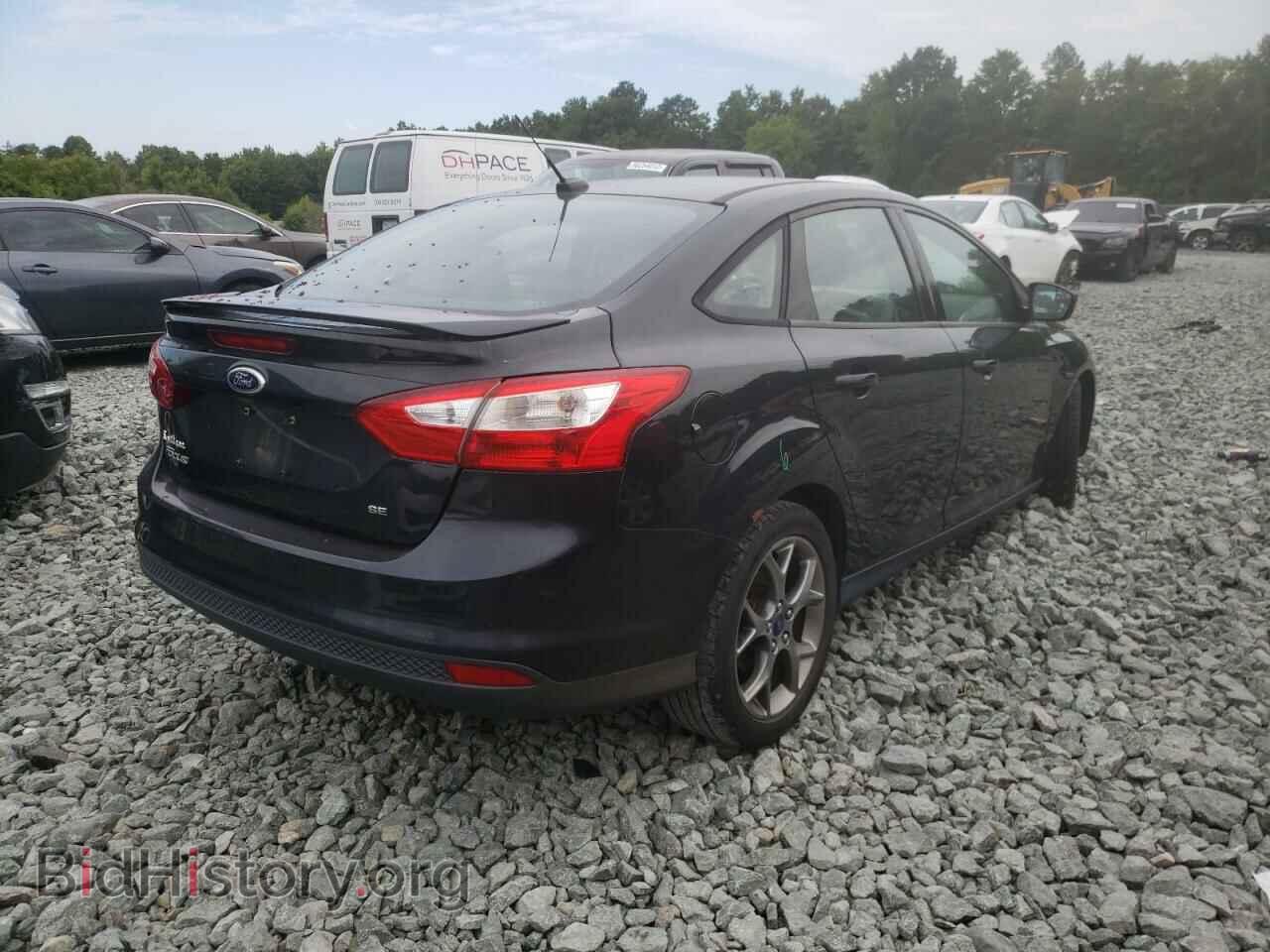 2014 FORD FOCUS - VIN: 1FADP3F25EL404589 - Photo 4