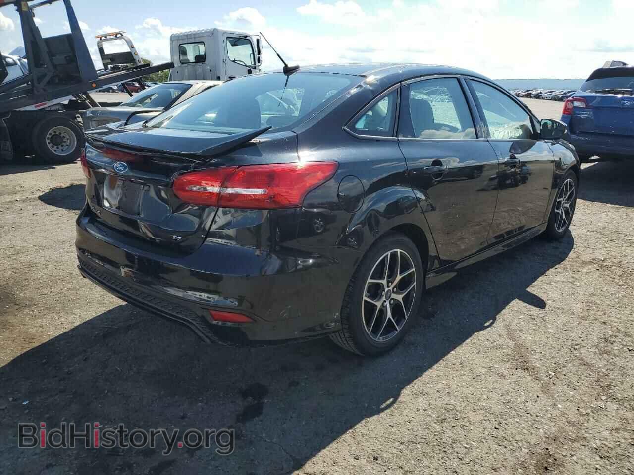 2015 FORD FOCUS - VIN: 1FADP3F2XFL321371 - Photo 4