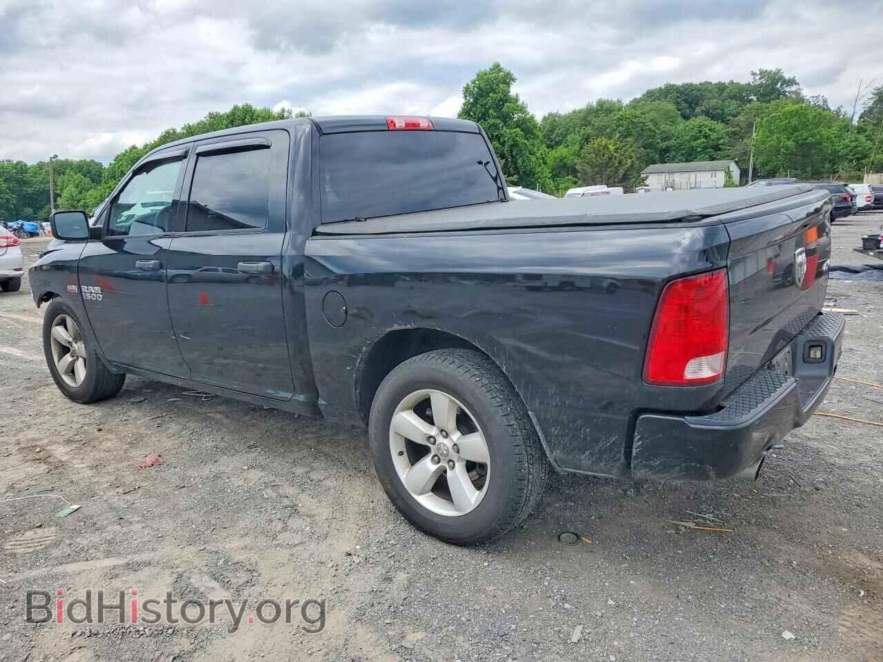 2014 RAM 1500 - VIN: 3C6RR7KT2EG210512 - Фото 2