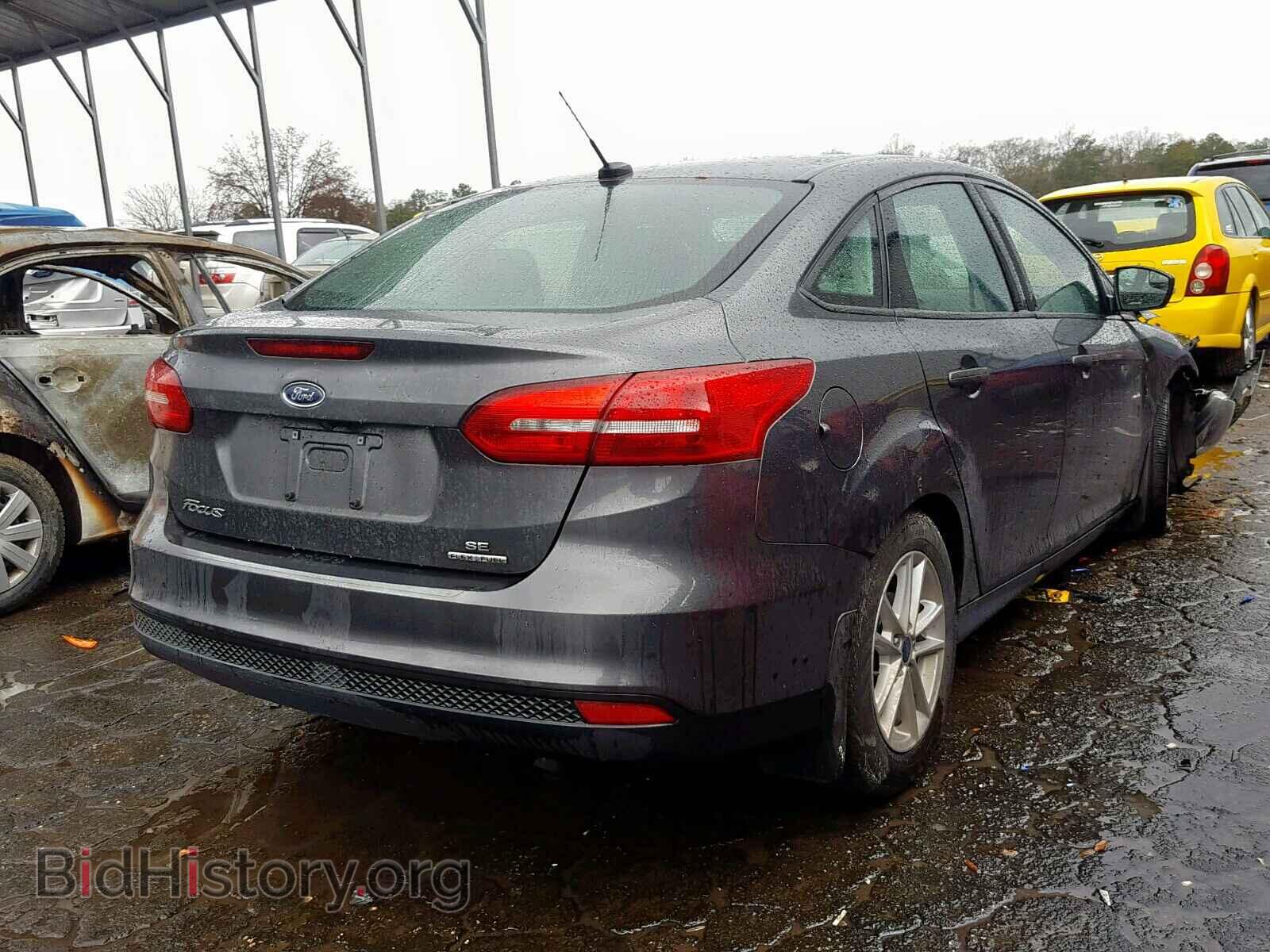 2016 FORD FOCUS SE - VIN: 1FADP3F2XGL389462 - Фото 4