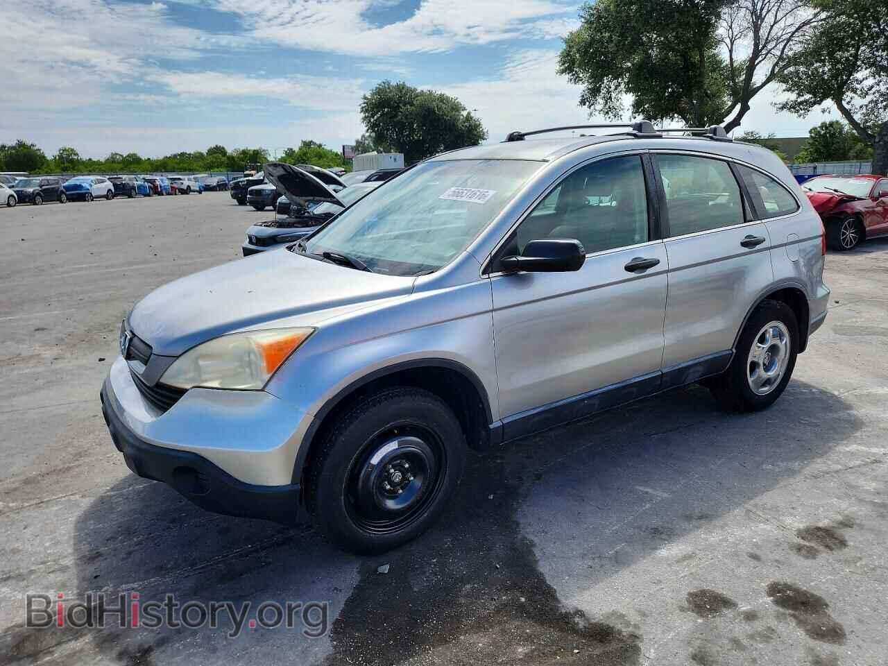 Фотография JHLRE38397C018887 - HONDA CRV 2007