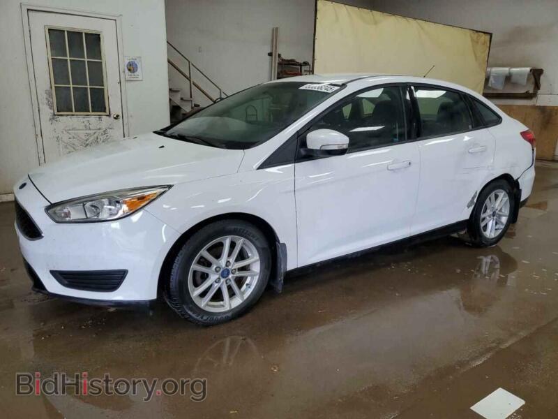 2017 Ford FOCUS SE (VIN 1FADP3F2XHL329991) — photo 1 of 16, Copart, damage: side