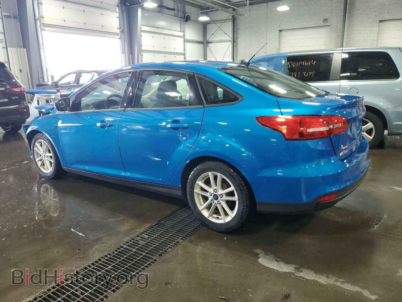 2016 FORD FOCUS - VIN: 1FADP3F25GL379860 - Фото 2