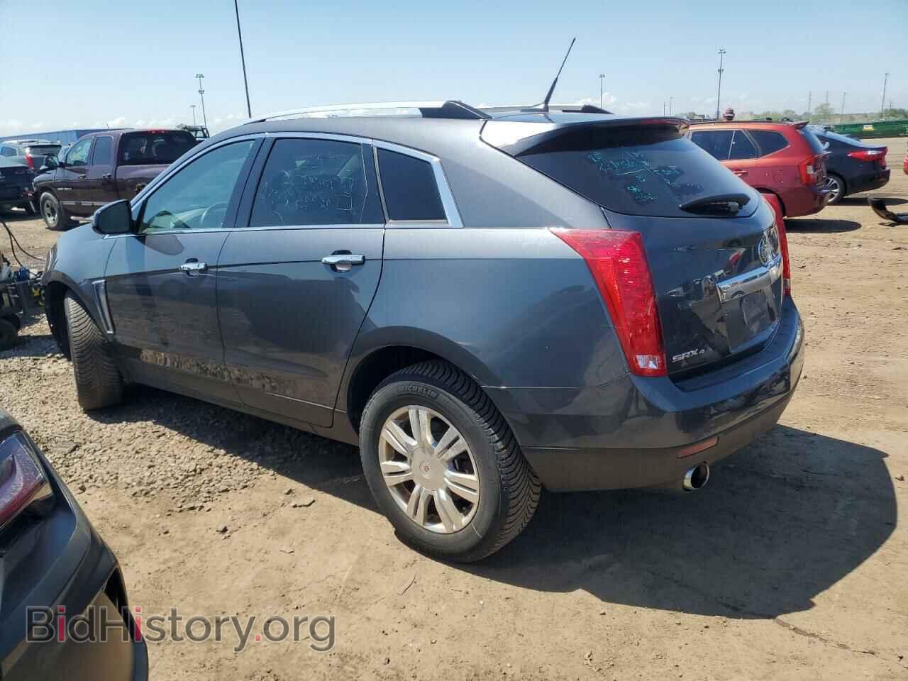 2013 CADILLAC SRX - VIN: 3GYFNGE39DS598671 - Фото 2