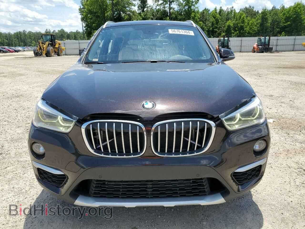 2018 BMW X1 - VIN: WBXHT3C30J5L34909 - Фото 5