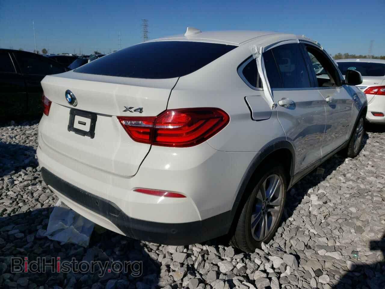 2015 BMW X4 - VIN: 5UXXW3C56F0F88874 - Фото 4