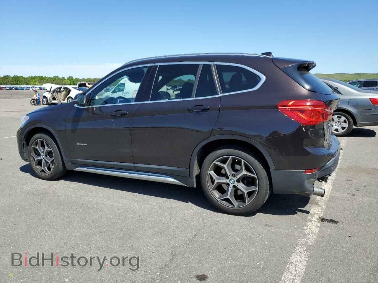 2016 BMW X1 - VIN: WBXHT3C35G5E48142 - Фото 2
