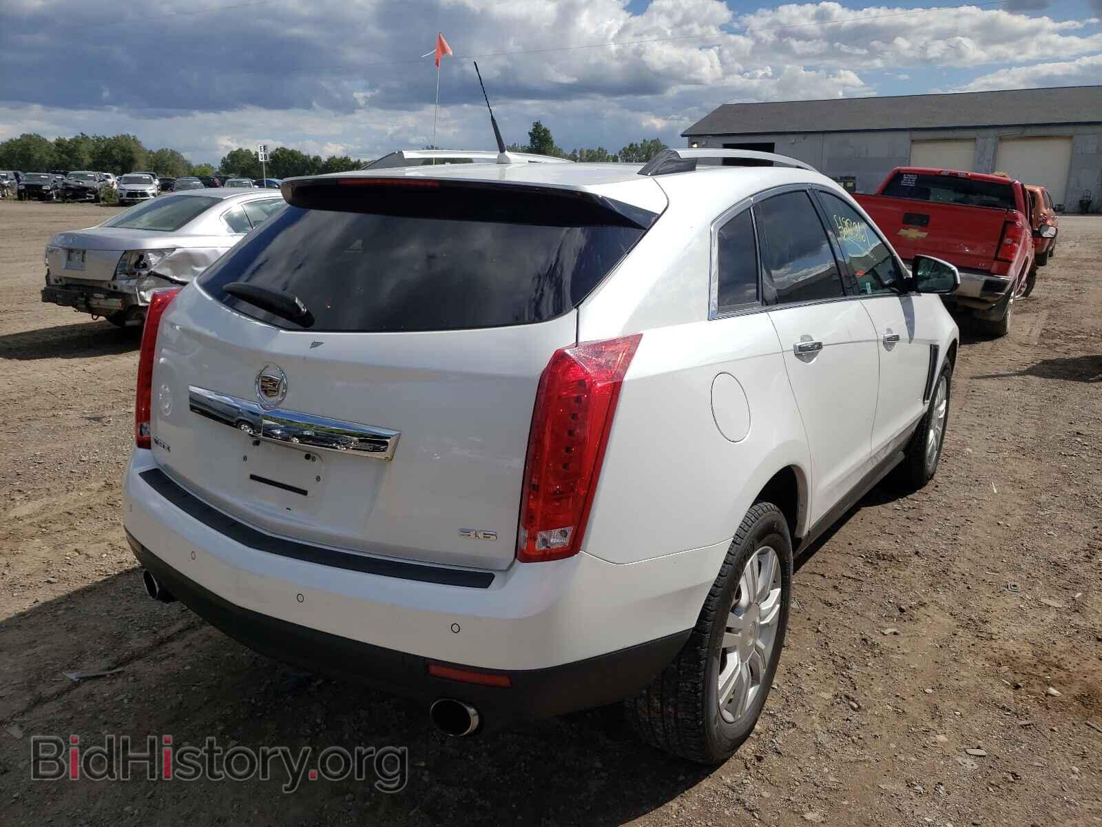 2013 CADILLAC SRX - VIN: 3GYFNCE39DS539130 - Фото 4