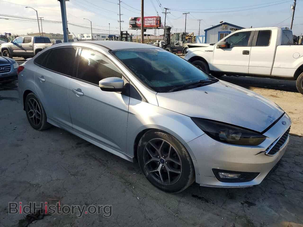 2015 FORD FOCUS - VIN: 1FADP3F21FL357949 - Photo 4