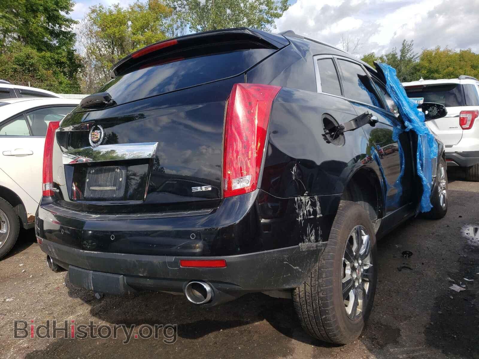 2014 CADILLAC SRX - VIN: 3GYFNEE36ES520998 - Фото 4
