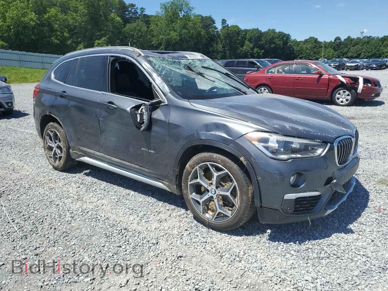 2017 BMW X1 - VIN: WBXHT3C38H5F85884 - Фото 4
