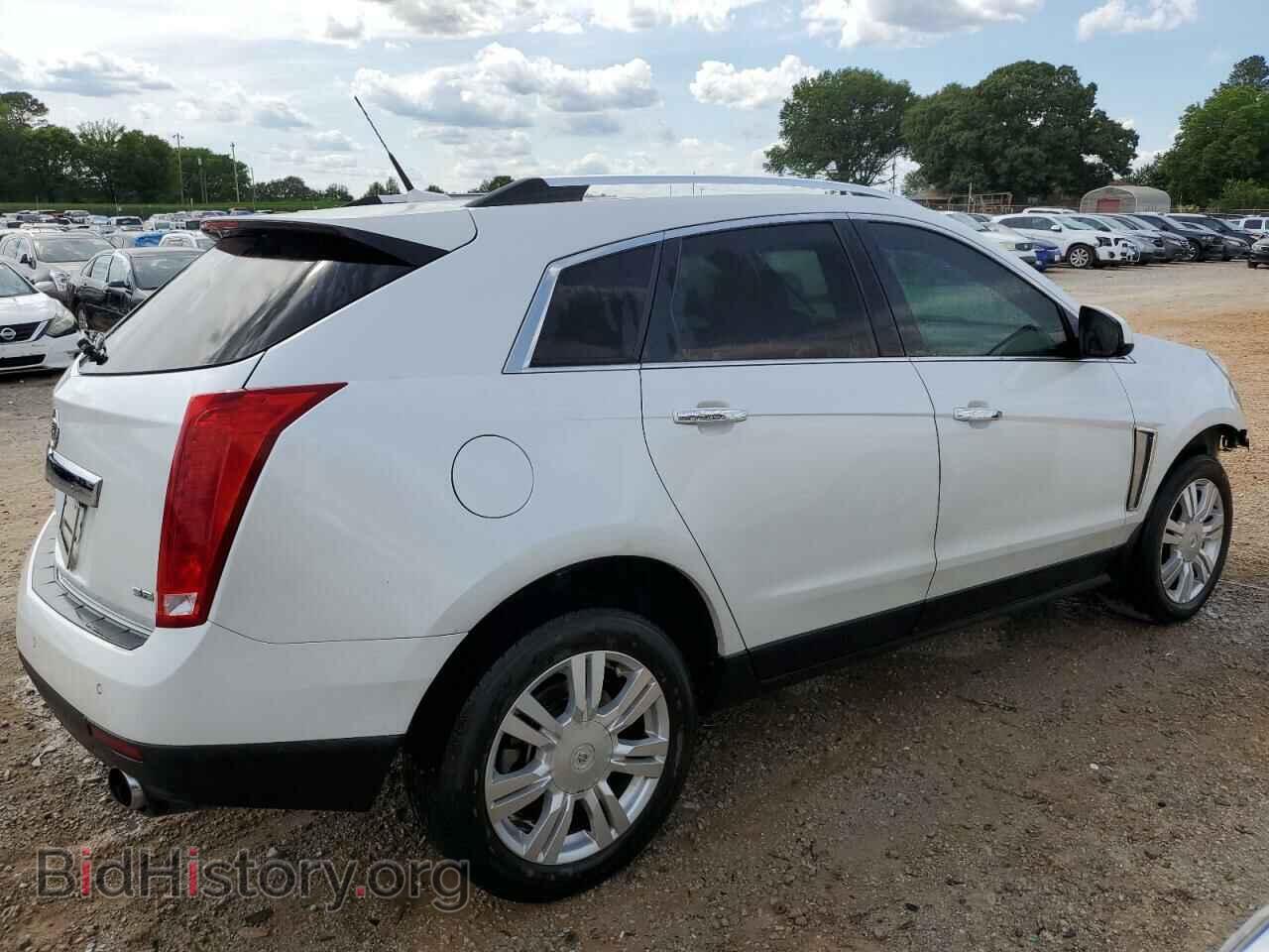 2013 CADILLAC SRX - VIN: 3GYFNCE38DS561121 - Фото 3