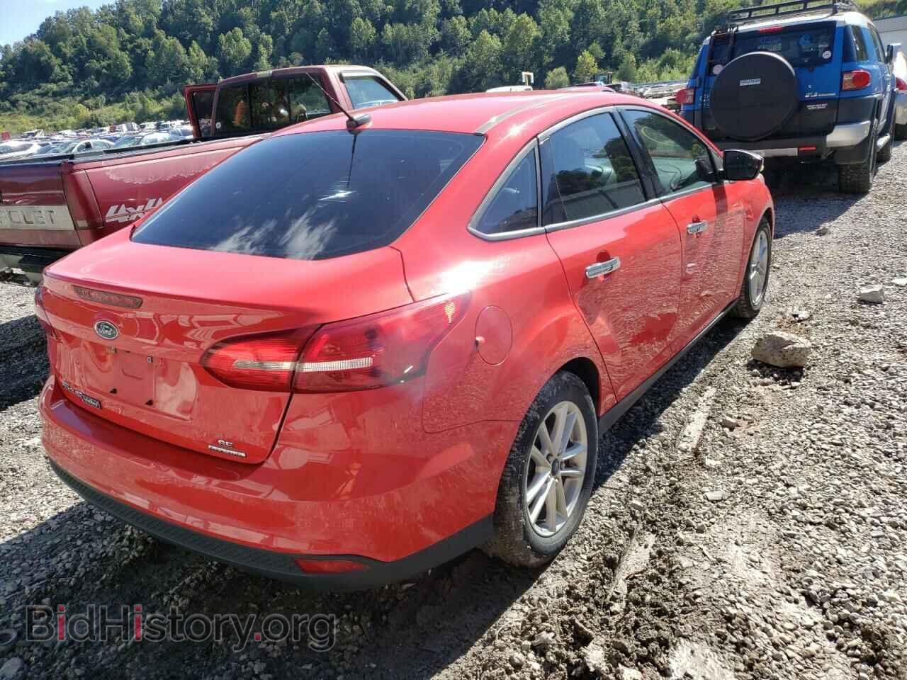 2015 FORD FOCUS - VIN: 1FADP3F21FL244065 - Photo 4