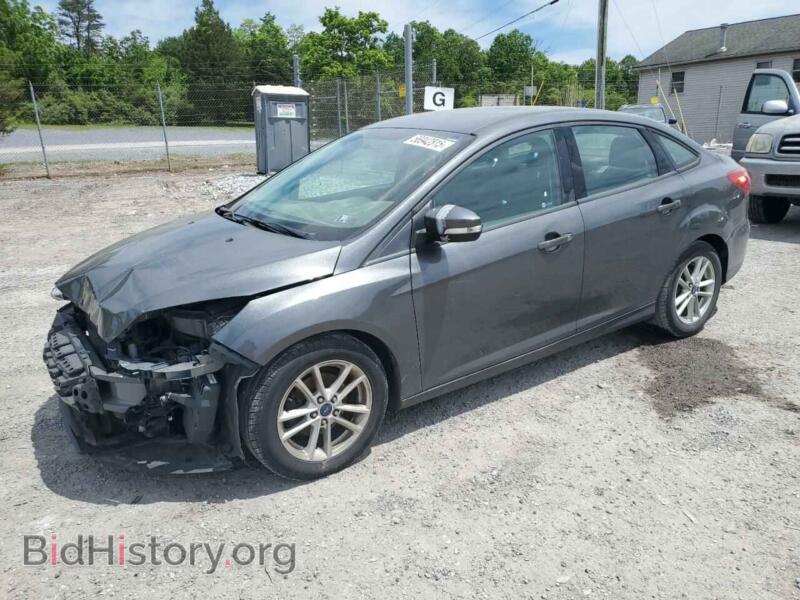 2017 Ford FOCUS SE (VIN 1FADP3F2XHL201380) — photo 1 of 14, Copart, damage: front end