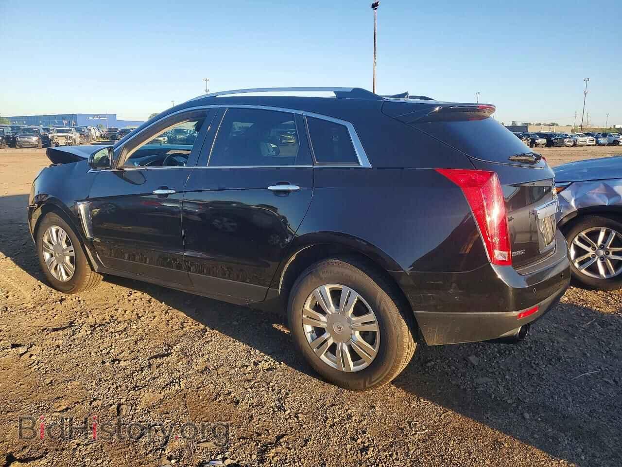 2013 CADILLAC SRX - VIN: 3GYFNCE30DS578043 - Фото 2
