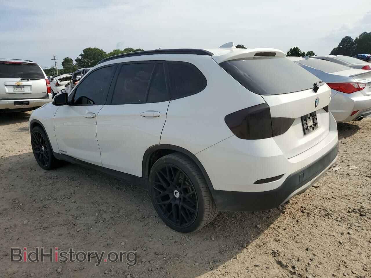 2014 BMW X1 - VIN: WBAVM1C57EVW52001 - Фото 2