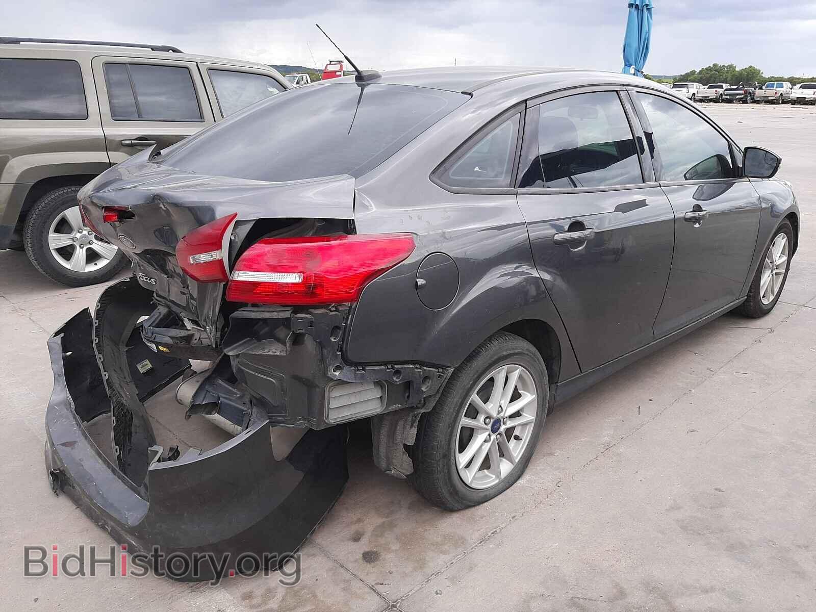 2016 FORD FOCUS - VIN: 1FADP3F27GL383148 - Photo 4