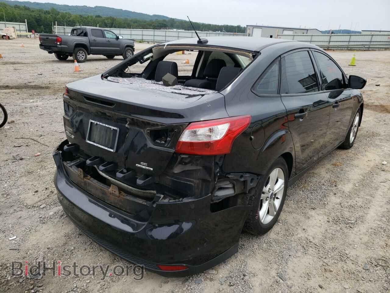 2014 FORD FOCUS - VIN: 1FADP3F20EL204719 - Photo 4