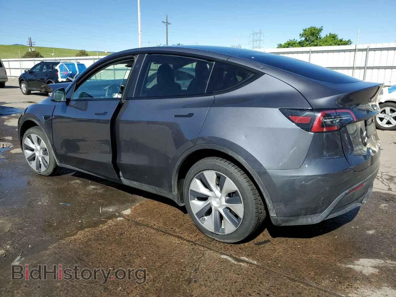 2023 TESLA MODEL Y - VIN: 7SAYGDEEXPF886210 - Фото 2