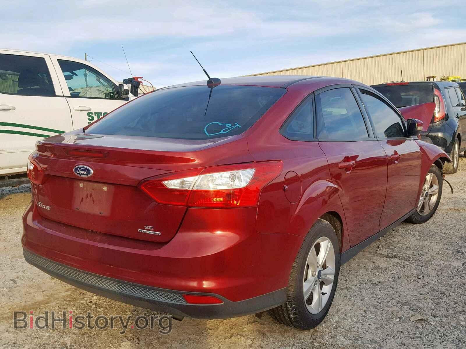 2014 FORD FOCUS - VIN: 1FADP3F21EL409904 - Photo 4