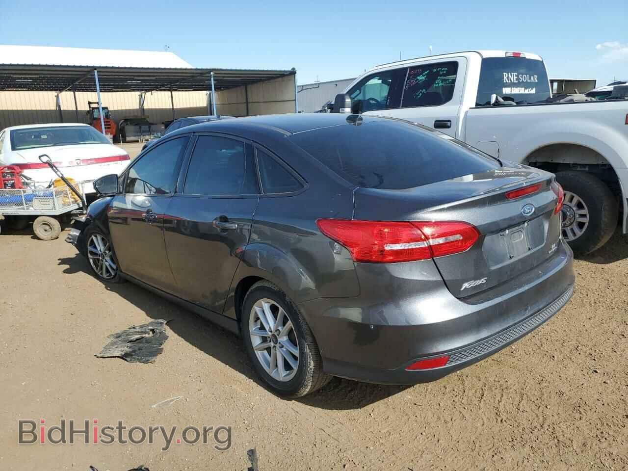 2016 FORD FOCUS - VIN: 1FADP3F22GL380318 - Фото 2