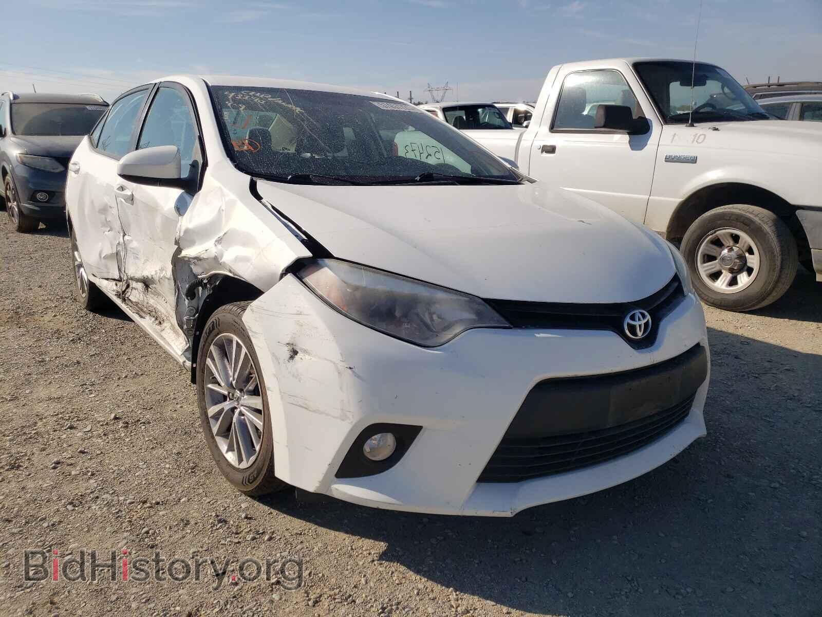 Фотография 5YFBURHE9EP148145 - TOYOTA COROLLA 2014