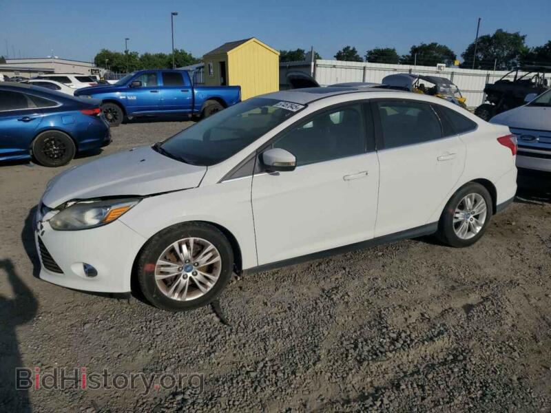 2012 Ford FOCUS SEL (VIN 1FAHP3H28CL201031) — фото 1 из 12, Copart, повреждение: передняя часть