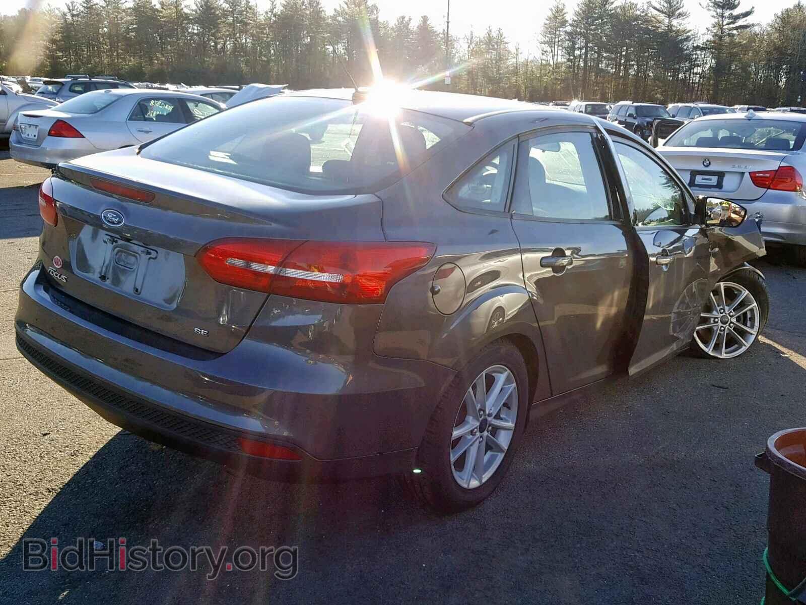 2016 FORD FOCUS - VIN: 1FADP3F22GL223596 - Photo 4