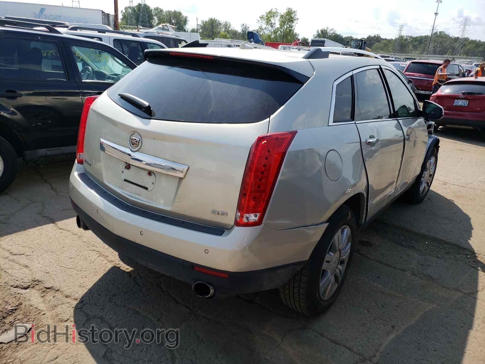 2013 CADILLAC SRX - VIN: 3GYFNCE3XDS562447 - Фото 4