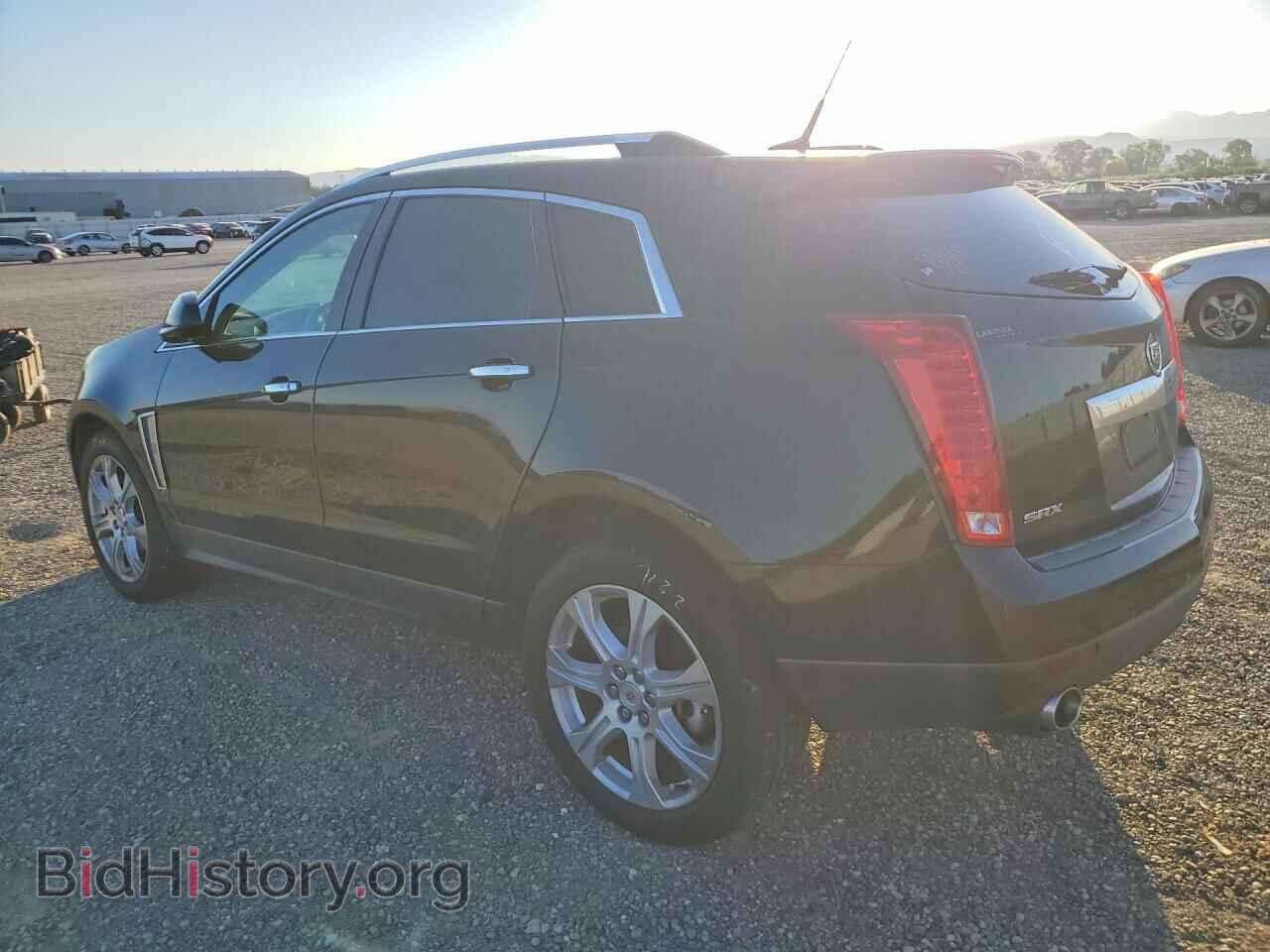 2014 CADILLAC SRX - VIN: 3GYFNCE32ES565702 - Фото 2