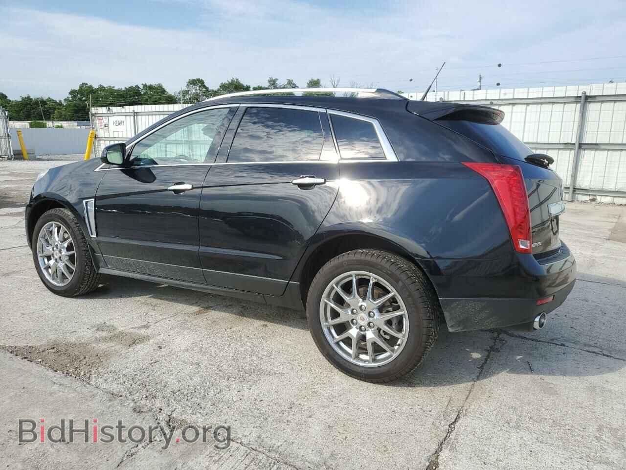 2014 CADILLAC SRX - VIN: 3GYFNCE39ES681205 - Фото 2