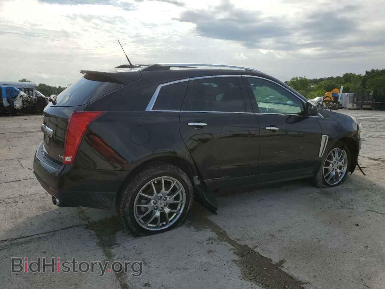 2014 CADILLAC SRX - VIN: 3GYFNCE39ES681205 - Фото 3