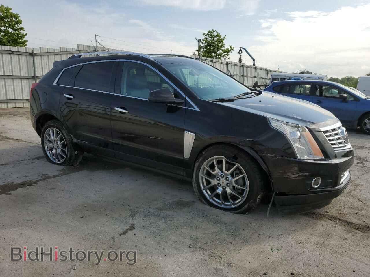 2014 CADILLAC SRX - VIN: 3GYFNCE39ES681205 - Фото 4