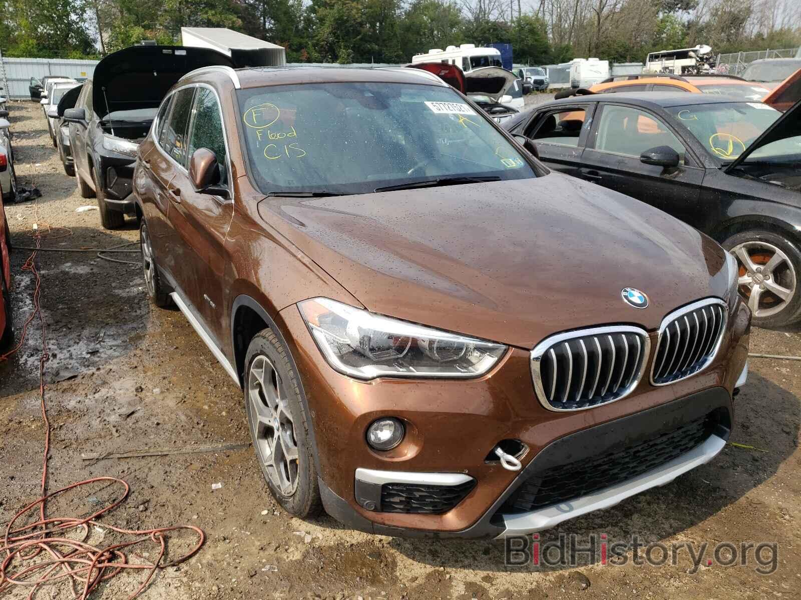 Фотография WBXHT3C31H5F79179 - BMW X1 2017