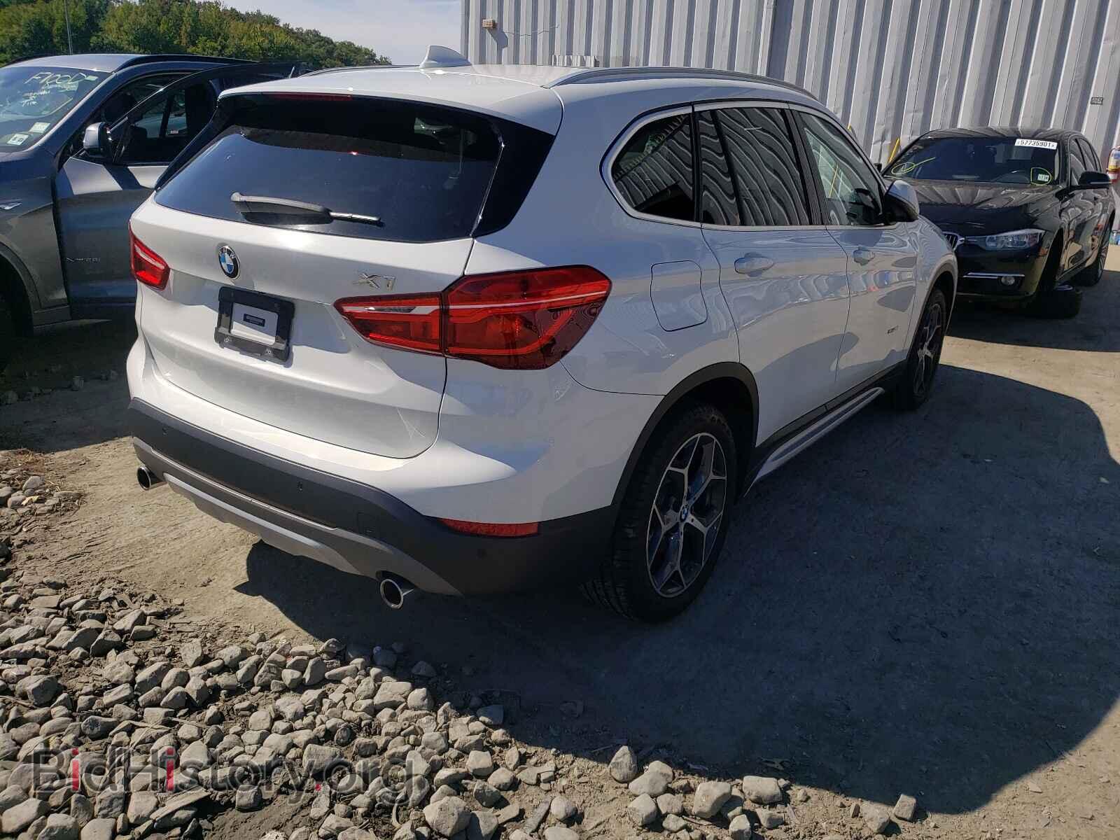 2018 BMW X1 - VIN: WBXHT3C33J5K23402 - Фото 4