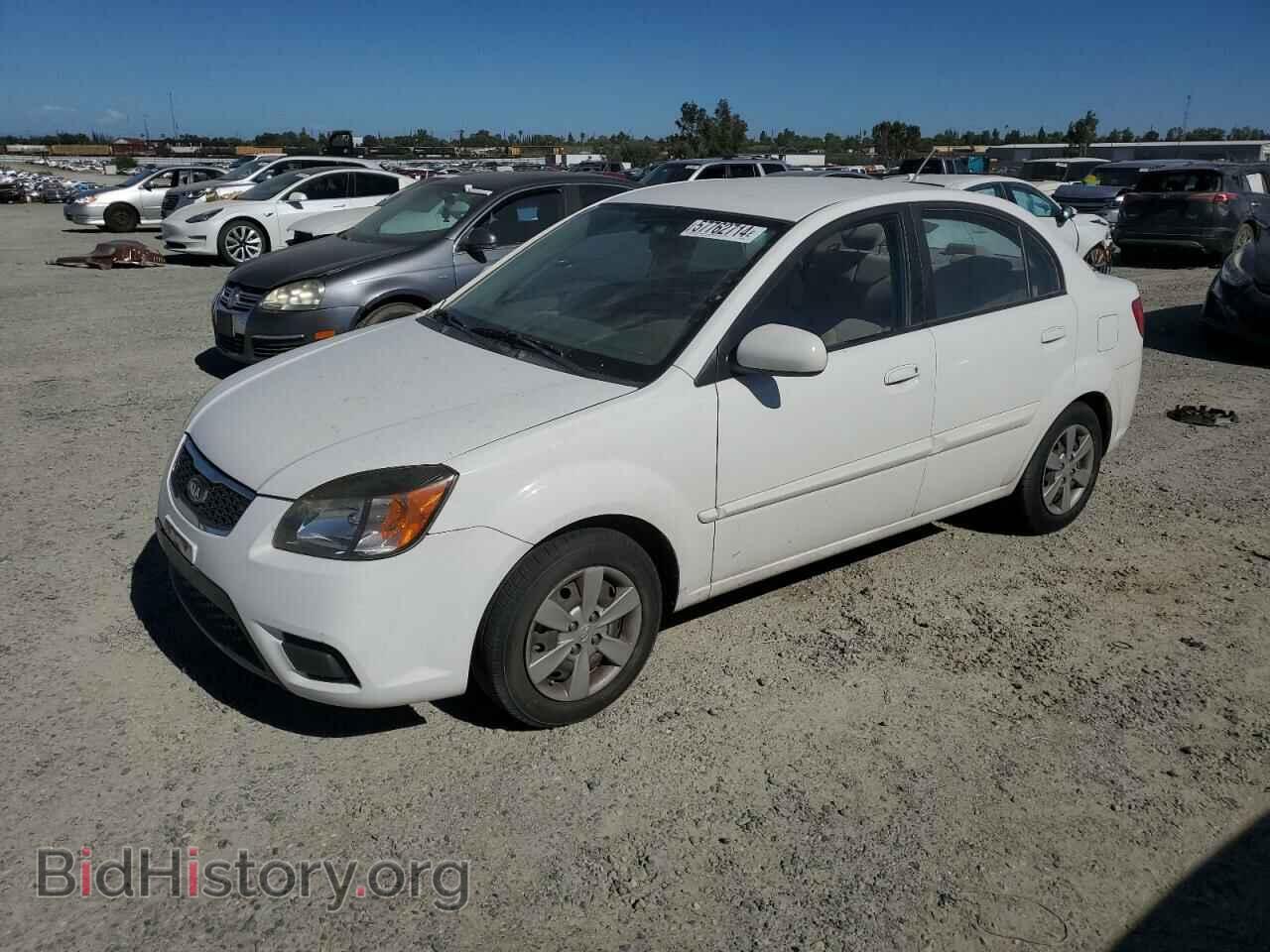 Фотография KNADH4A37A6650174 - KIA RIO 2010