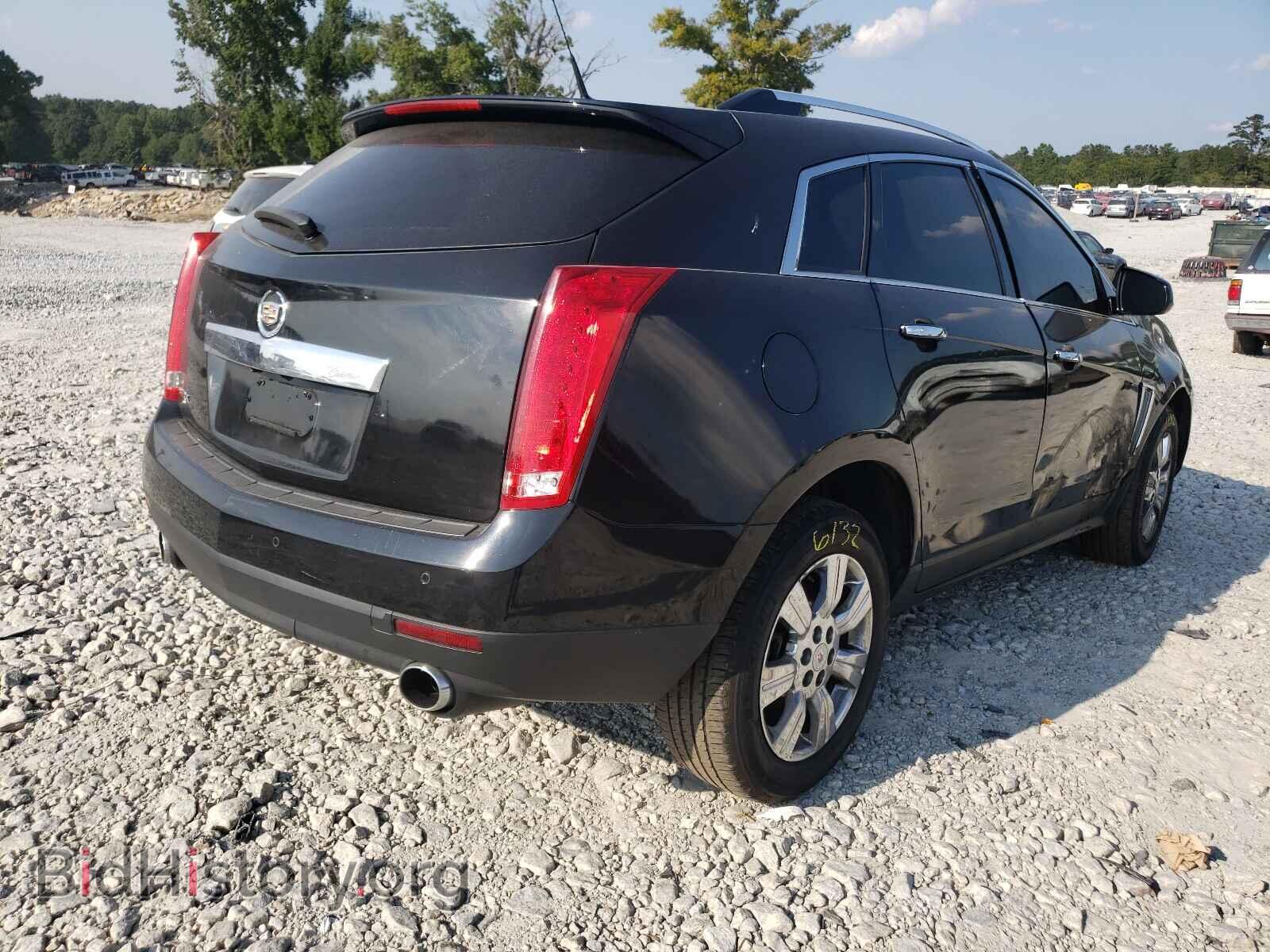 2014 CADILLAC SRX - VIN: 3GYFNBE37ES566564 - Фото 4