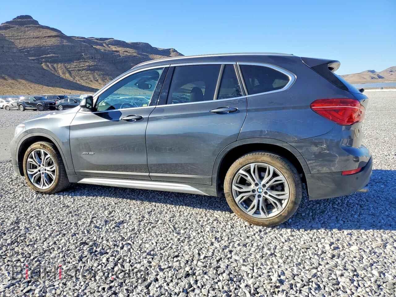 2016 BMW X1 - VIN: WBXHT3C32GP883511 - Фото 2