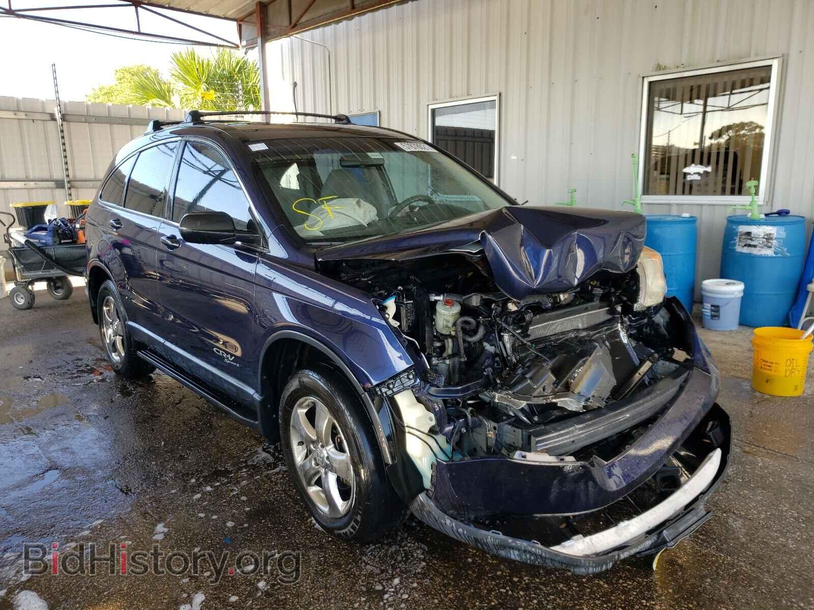 Photo JHLRE38359C004357 - HONDA CRV 2009