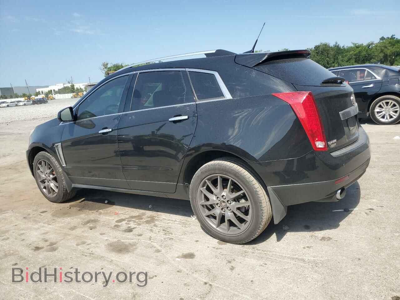 2014 CADILLAC SRX - VIN: 3GYFNDE35ES591071 - Фото 2
