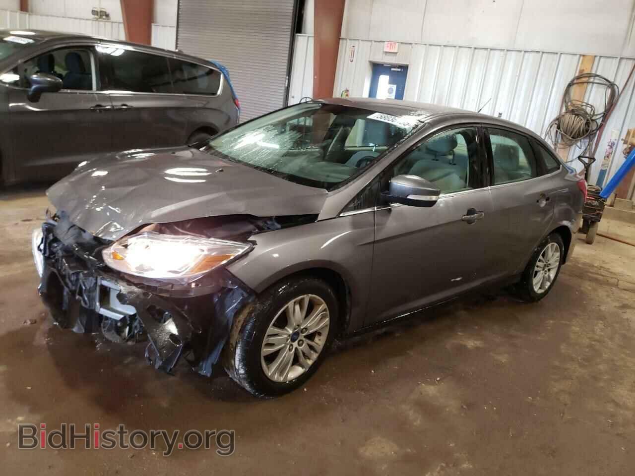 Фотография 1FAHP3H24CL358121 - FORD FOCUS 2012