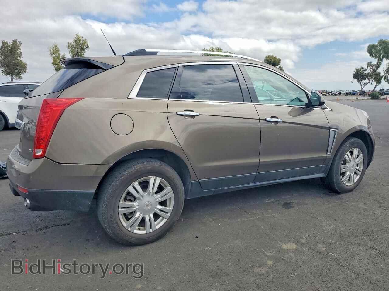 2014 CADILLAC SRX - VIN: 3GYFNBE39ES562029 - Фото 3