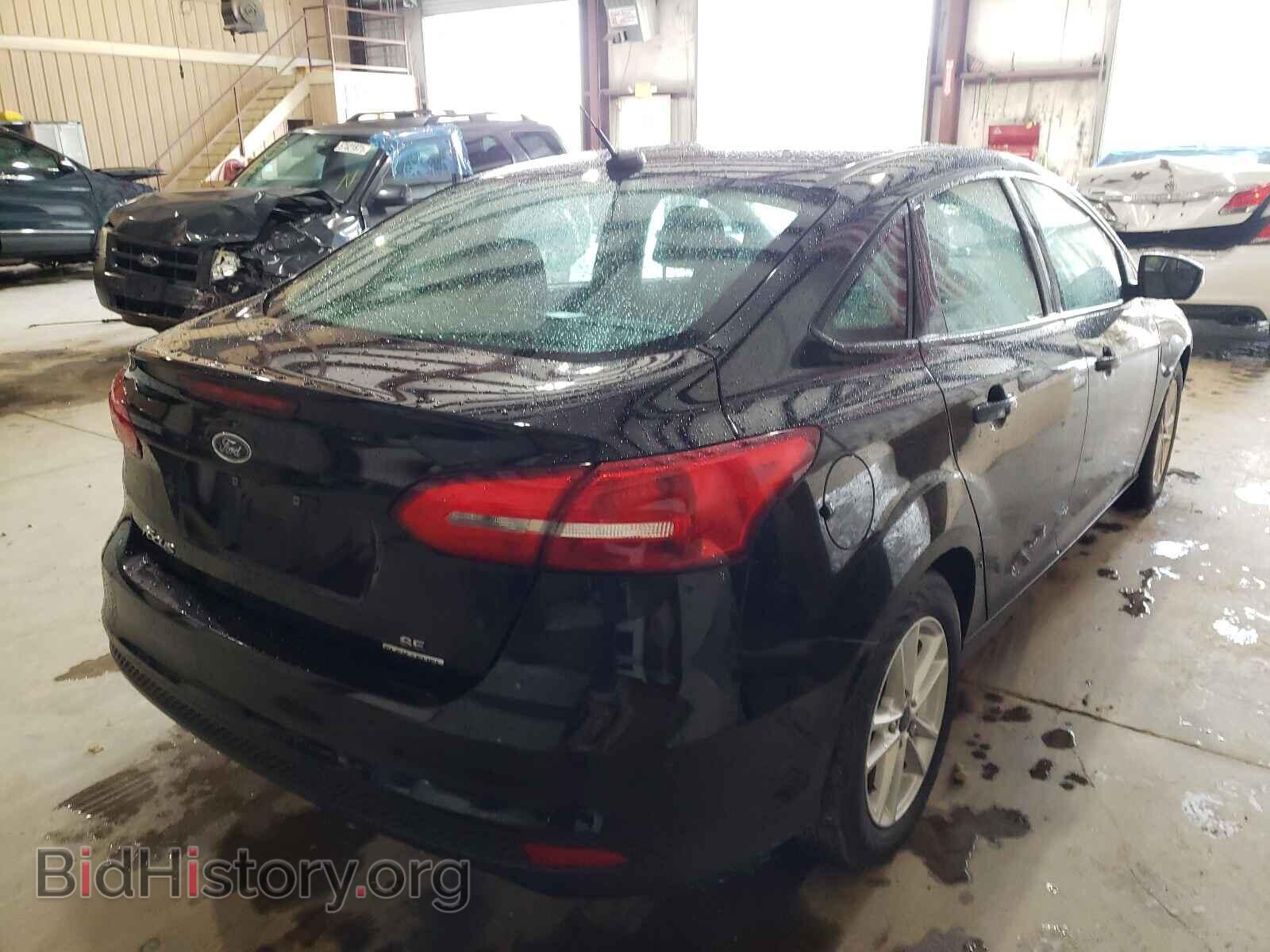 2016 FORD FOCUS - VIN: 1FADP3F21GL371934 - Photo 4