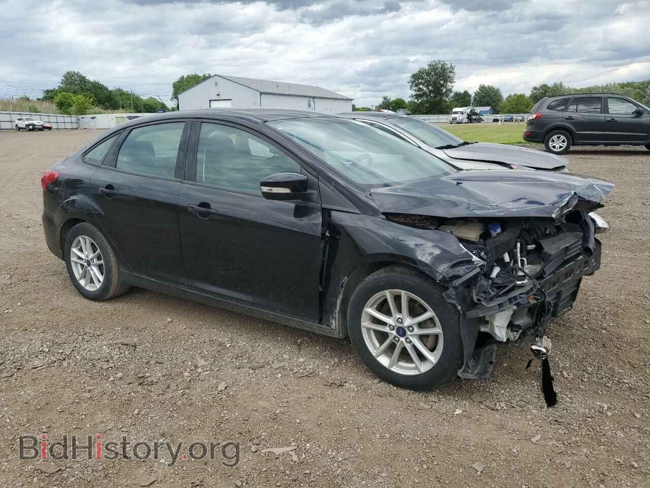 2017 FORD FOCUS - VIN: 1FADP3F23HL341304 - Photo 4
