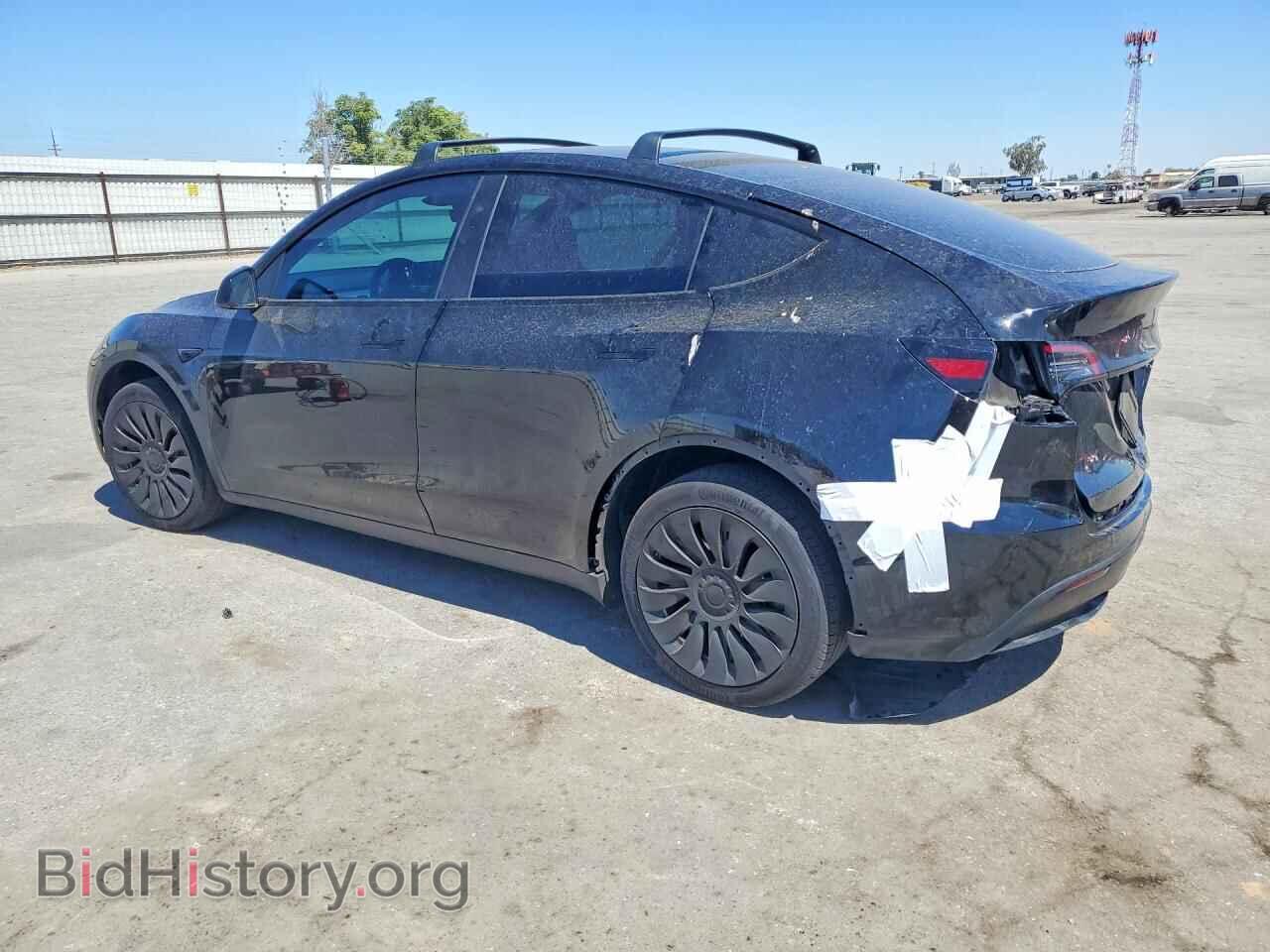 2023 TESLA MODEL Y - VIN: 7SAYGDEE8PF816799 - Photo 2