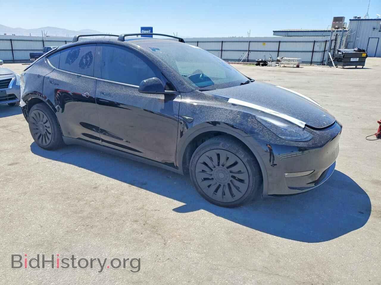 2023 TESLA MODEL Y - VIN: 7SAYGDEE8PF816799 - Photo 4